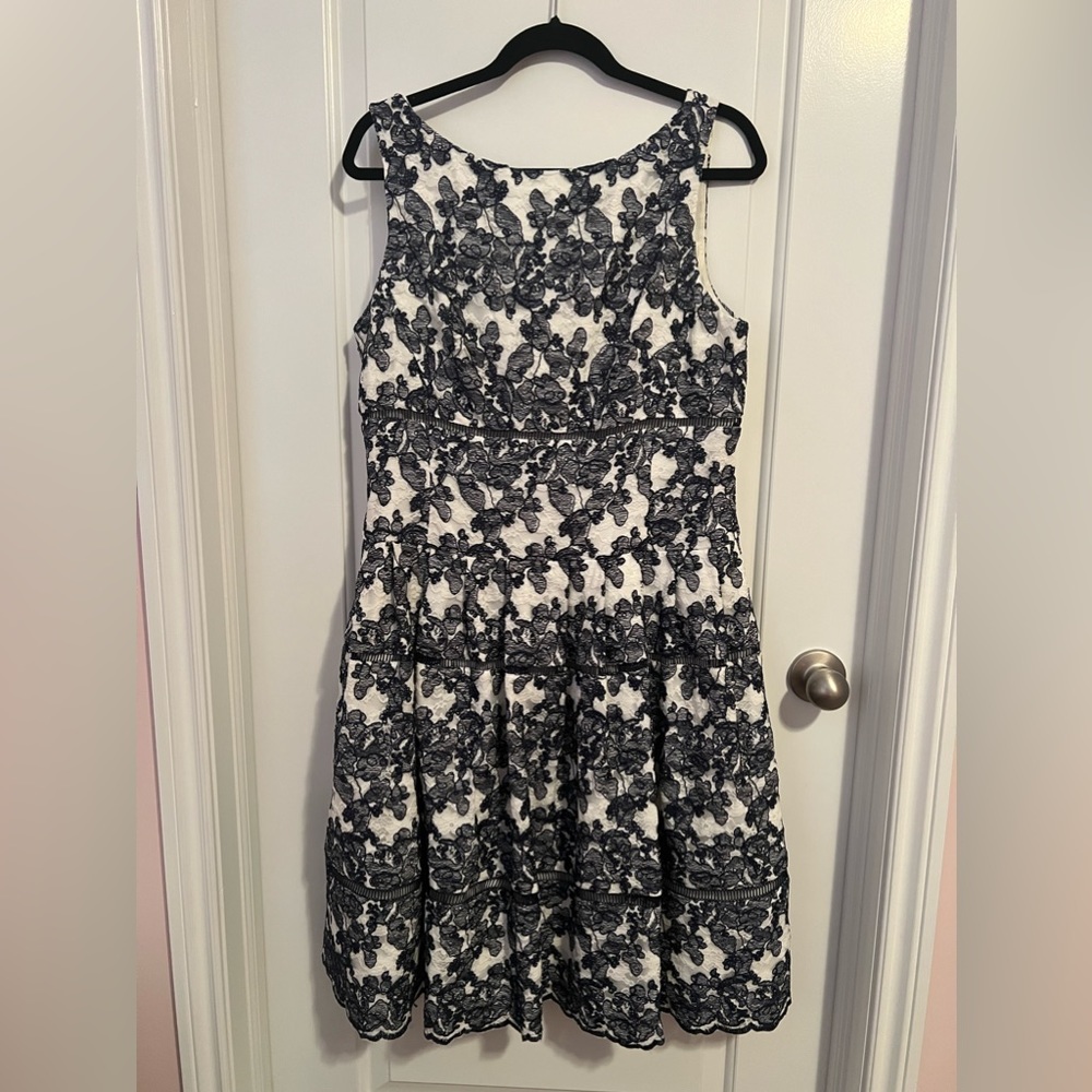 Knee length pleated boatneck dress